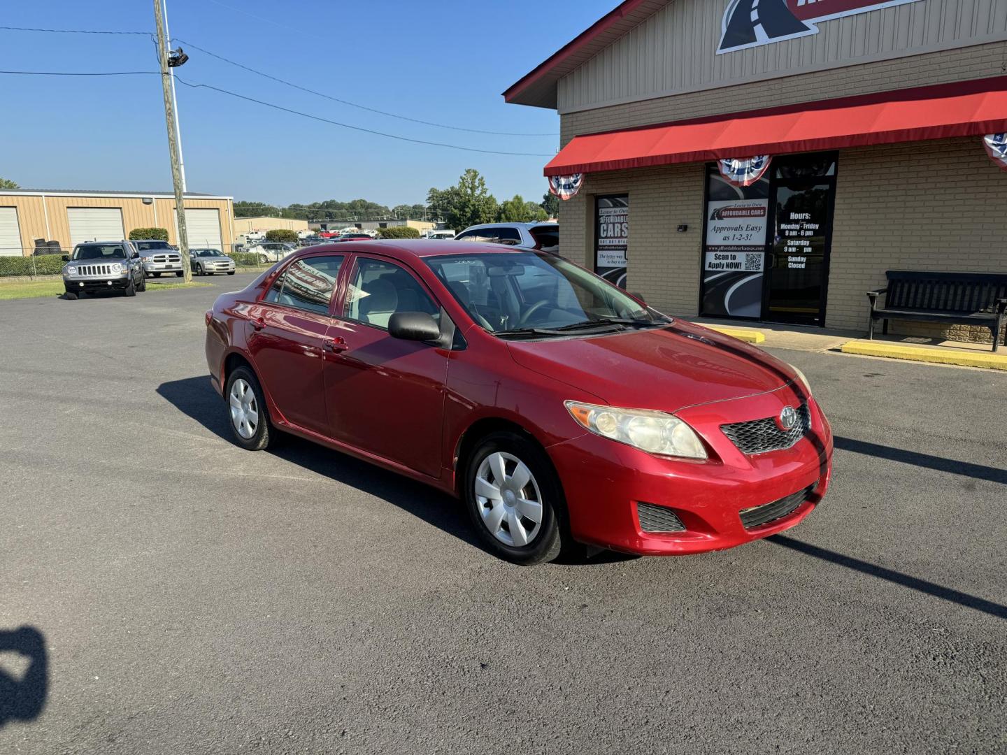 2009 Red Toyota Corolla (JTDBL40E499) with an 4-Cyl, 1.8 Liter engine, Automatic, 4-Spd w/Overdrive transmission, located at 8008 Warden Rd, Sherwood, AR, 72120, (501) 801-6100, 34.830078, -92.186684 - Photo#2