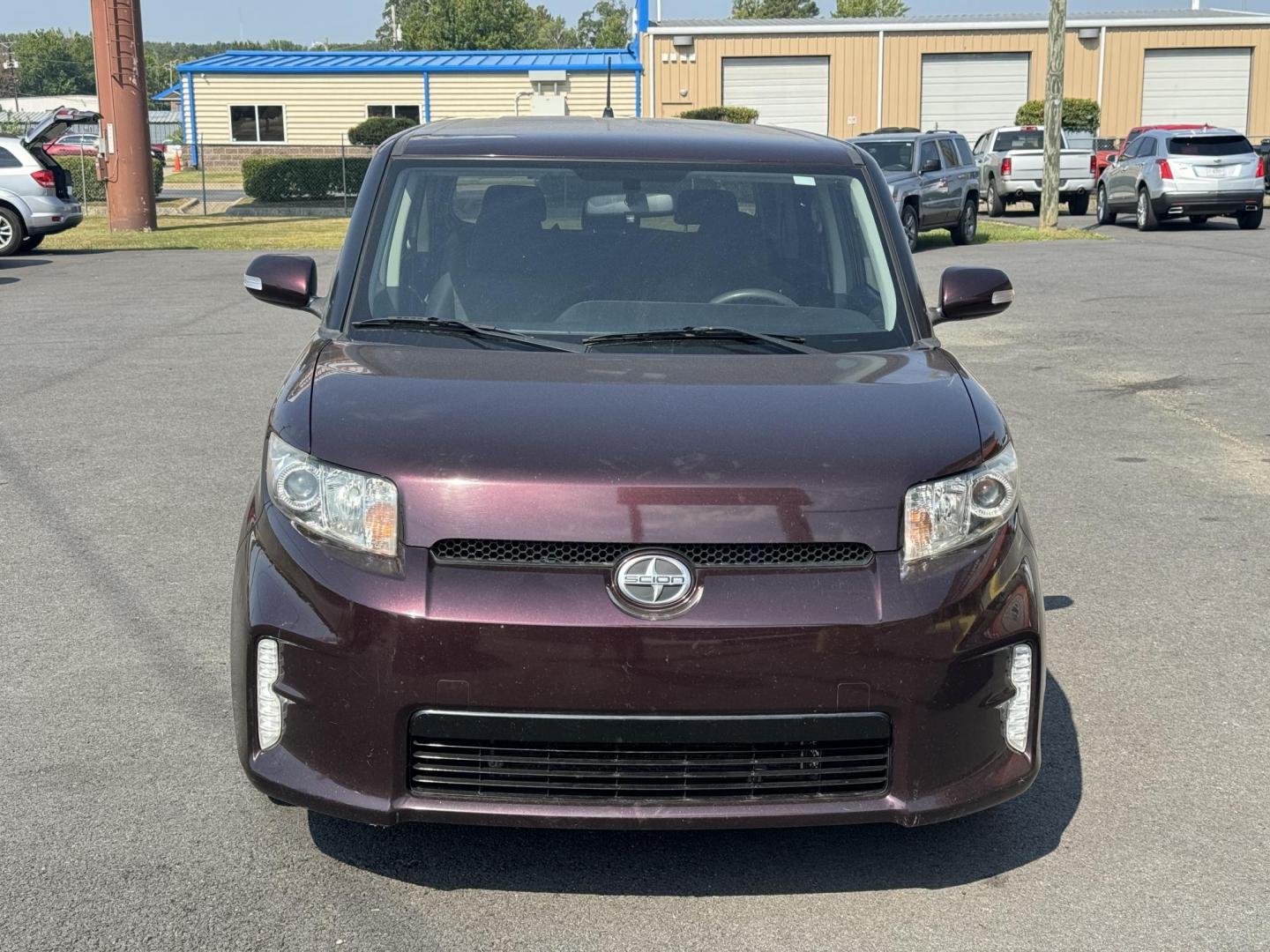 2014 Purple Scion xB (JTLZE4FE7EJ) with an 4-Cyl, 2.4 Liter engine, Automatic, 4-Spd transmission, located at 8008 Warden Rd, Sherwood, AR, 72120, (501) 801-6100, 34.830078, -92.186684 - Photo#1