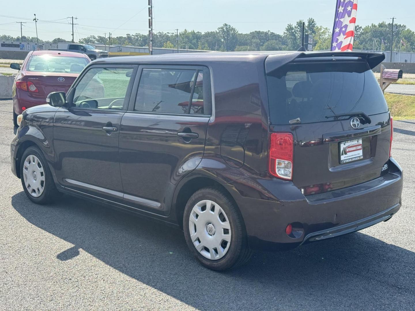 2014 Purple Scion xB (JTLZE4FE7EJ) with an 4-Cyl, 2.4 Liter engine, Automatic, 4-Spd transmission, located at 8008 Warden Rd, Sherwood, AR, 72120, (501) 801-6100, 34.830078, -92.186684 - Photo#5