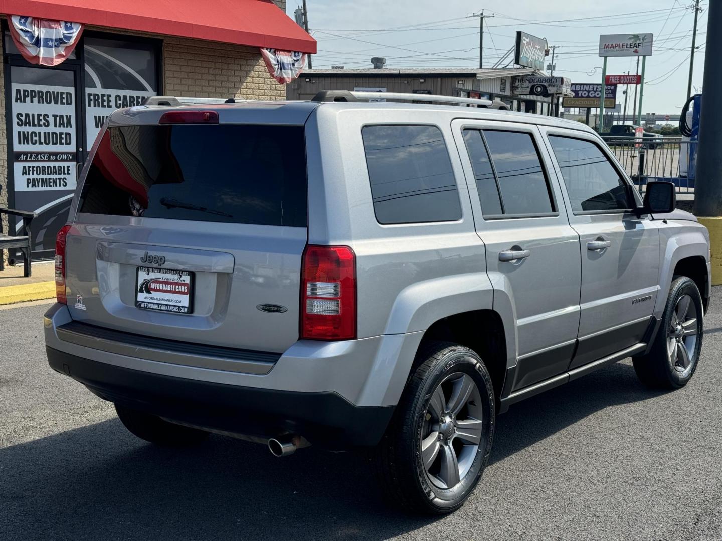 2016 Gray Jeep Patriot (1C4NJPBA3GD) with an 4-Cyl, 2.0 Liter engine, Auto, 6-Spd AutoStick transmission, located at 8008 Warden Rd, Sherwood, AR, 72120, (501) 801-6100, 34.830078, -92.186684 - Photo#9