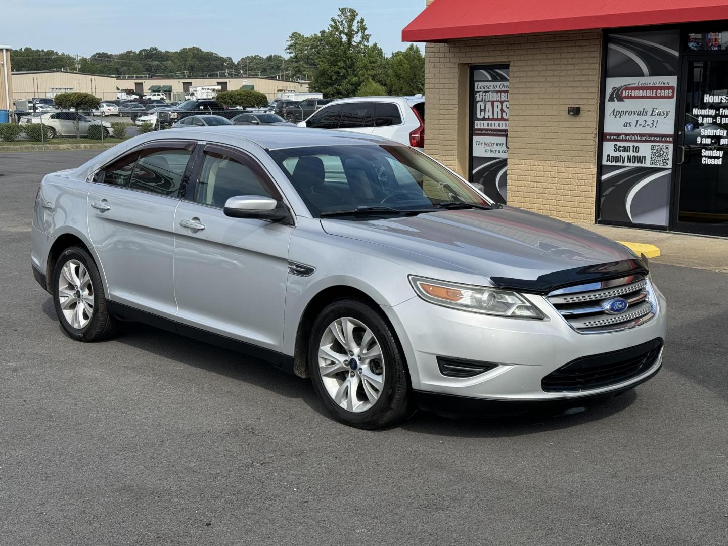 2012 Silver Ford Taurus (1FAHP2EW5CG) with an V6, 3.5 Liter engine, Automatic, 6-Spd transmission, located at 8008 Warden Rd, Sherwood, AR, 72120, (501) 801-6100, 34.830078, -92.186684 - Photo#1