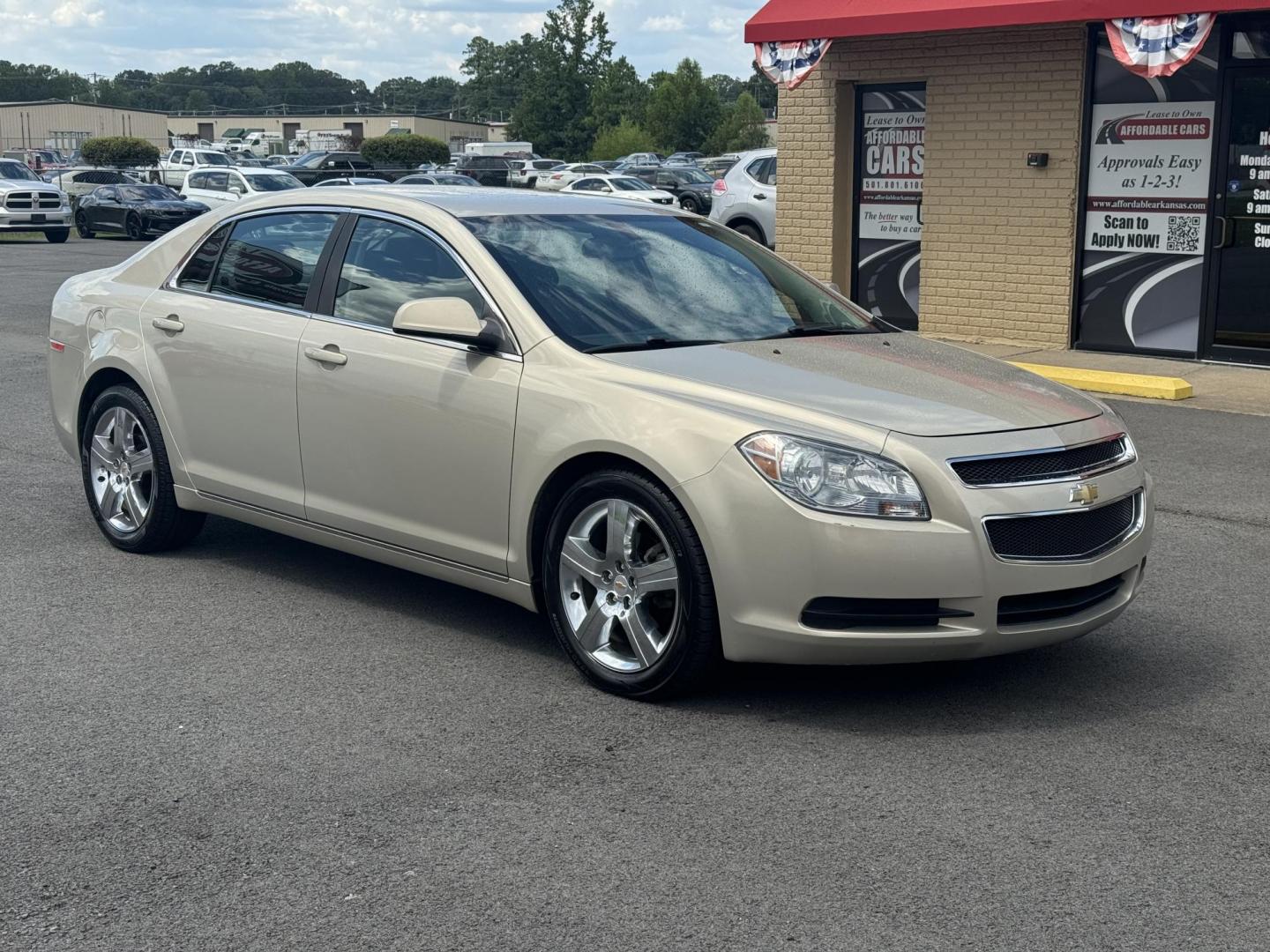 2011 Gold Chevrolet Malibu (1G1ZD5E1XBF) with an 4-Cyl, 2.4 Liter engine, Automatic, 6-Spd w/Overdrive and TAPshift transmission, located at 8008 Warden Rd, Sherwood, AR, 72120, (501) 801-6100, 34.830078, -92.186684 - Photo#2