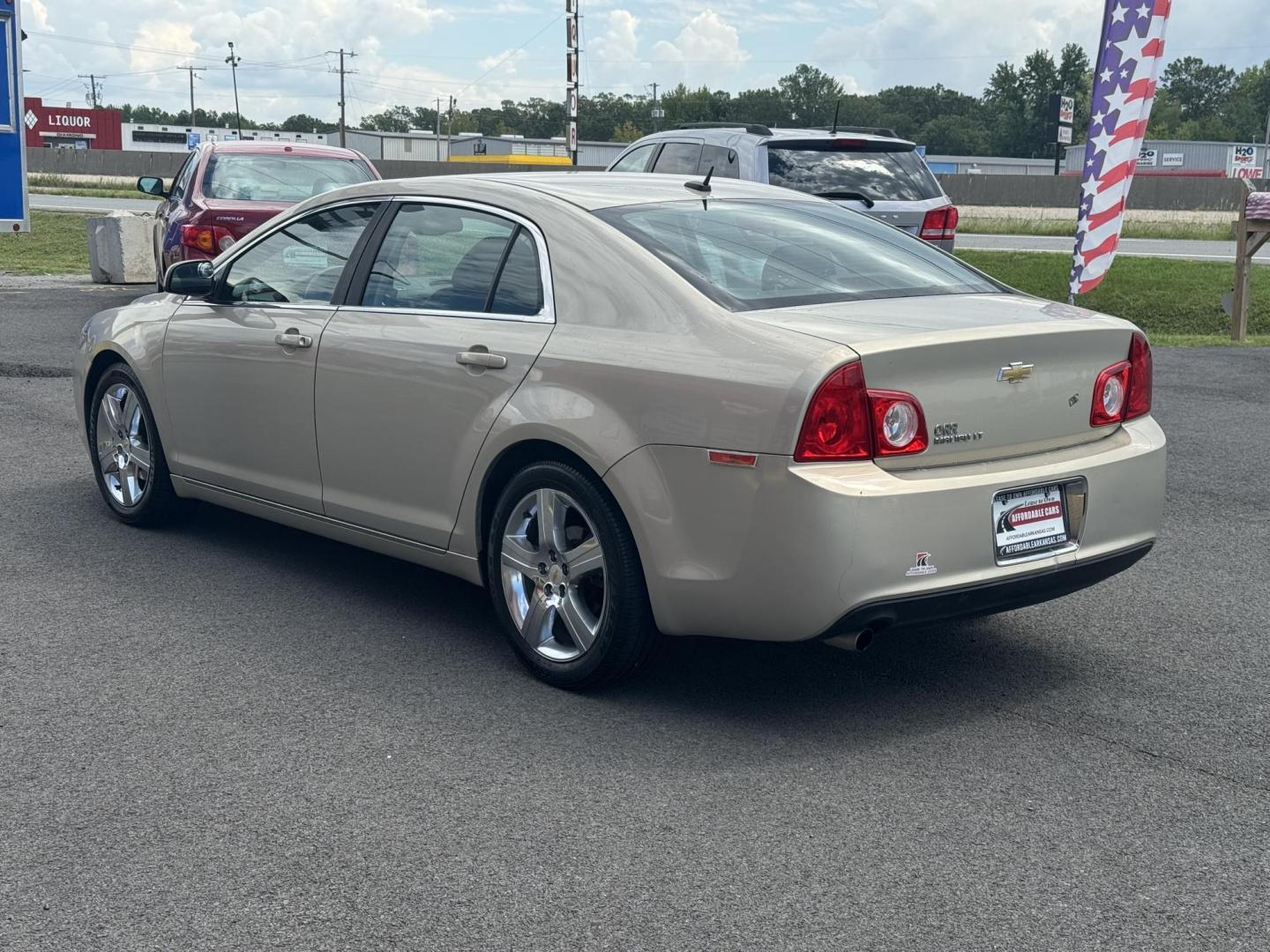 2011 Gold Chevrolet Malibu (1G1ZD5E1XBF) with an 4-Cyl, 2.4 Liter engine, Automatic, 6-Spd w/Overdrive and TAPshift transmission, located at 8008 Warden Rd, Sherwood, AR, 72120, (501) 801-6100, 34.830078, -92.186684 - Photo#6