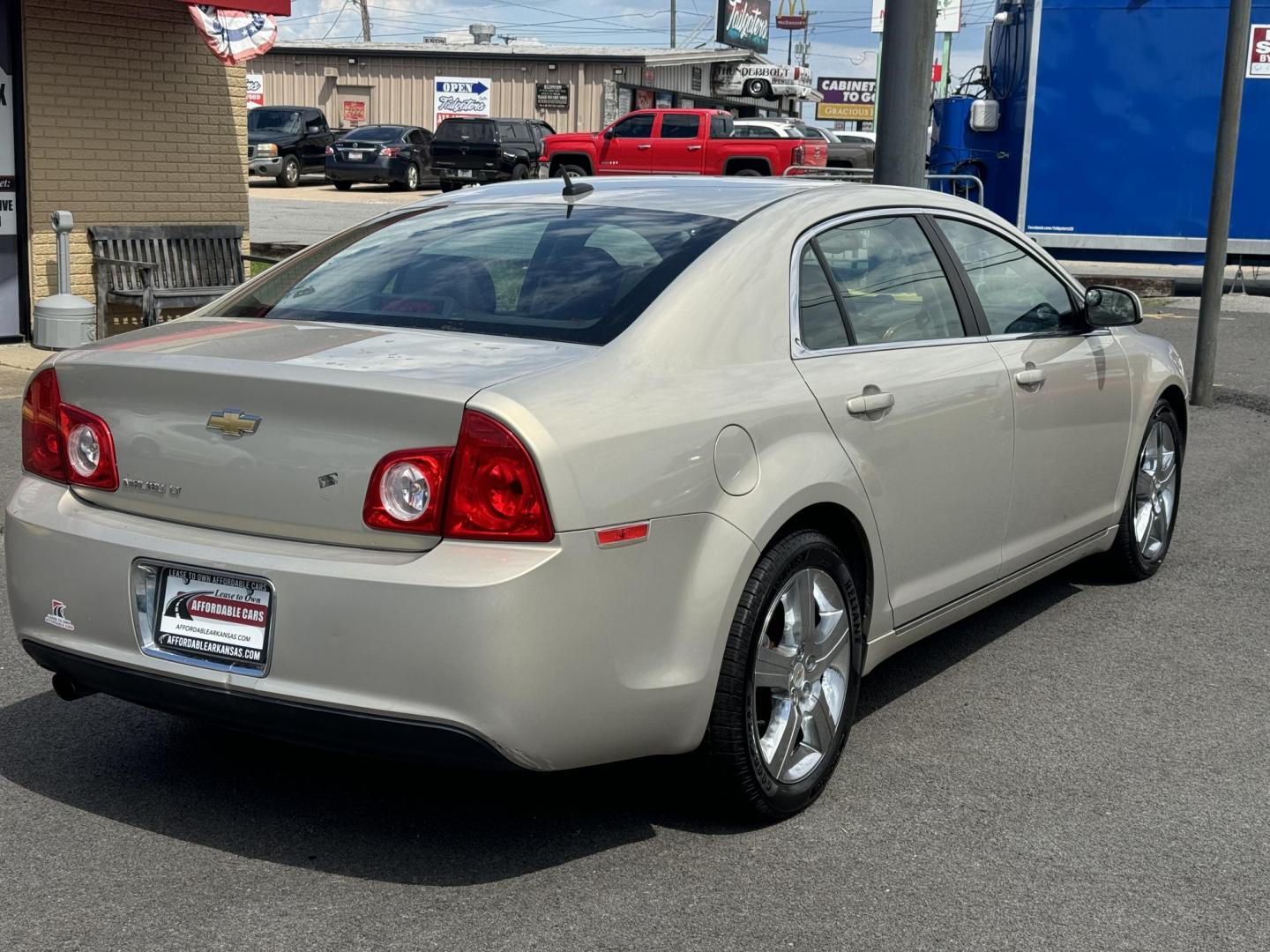 2011 Gold Chevrolet Malibu (1G1ZD5E1XBF) with an 4-Cyl, 2.4 Liter engine, Automatic, 6-Spd w/Overdrive and TAPshift transmission, located at 8008 Warden Rd, Sherwood, AR, 72120, (501) 801-6100, 34.830078, -92.186684 - Photo#7