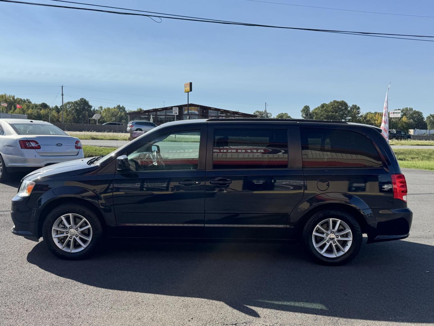 2016 Blue Dodge Grand Caravan Passenger (2C4RDGCG3GR) with an V6, Flex Fuel, 3.6 Liter engine, Automatic, 6-Spd transmission, located at 8008 Warden Rd, Sherwood, AR, 72120, (501) 801-6100, 34.830078, -92.186684 - Photo#4