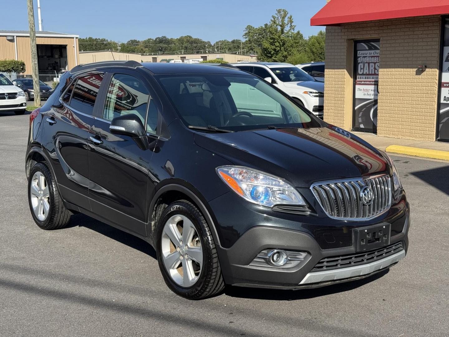 2016 Black Buick Encore (KL4CJBSB8GB) with an 4-Cyl, ECOTEC, 1.4T engine, Auto, 6-Spd OD ShftCtrl transmission, located at 8008 Warden Rd, Sherwood, AR, 72120, (501) 801-6100, 34.830078, -92.186684 - Photo#1