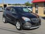 2016 Black Buick Encore (KL4CJBSB8GB) with an 4-Cyl, ECOTEC, 1.4T engine, Auto, 6-Spd OD ShftCtrl transmission, located at 8008 Warden Rd, Sherwood, AR, 72120, (501) 801-6100, 34.830078, -92.186684 - Photo#1