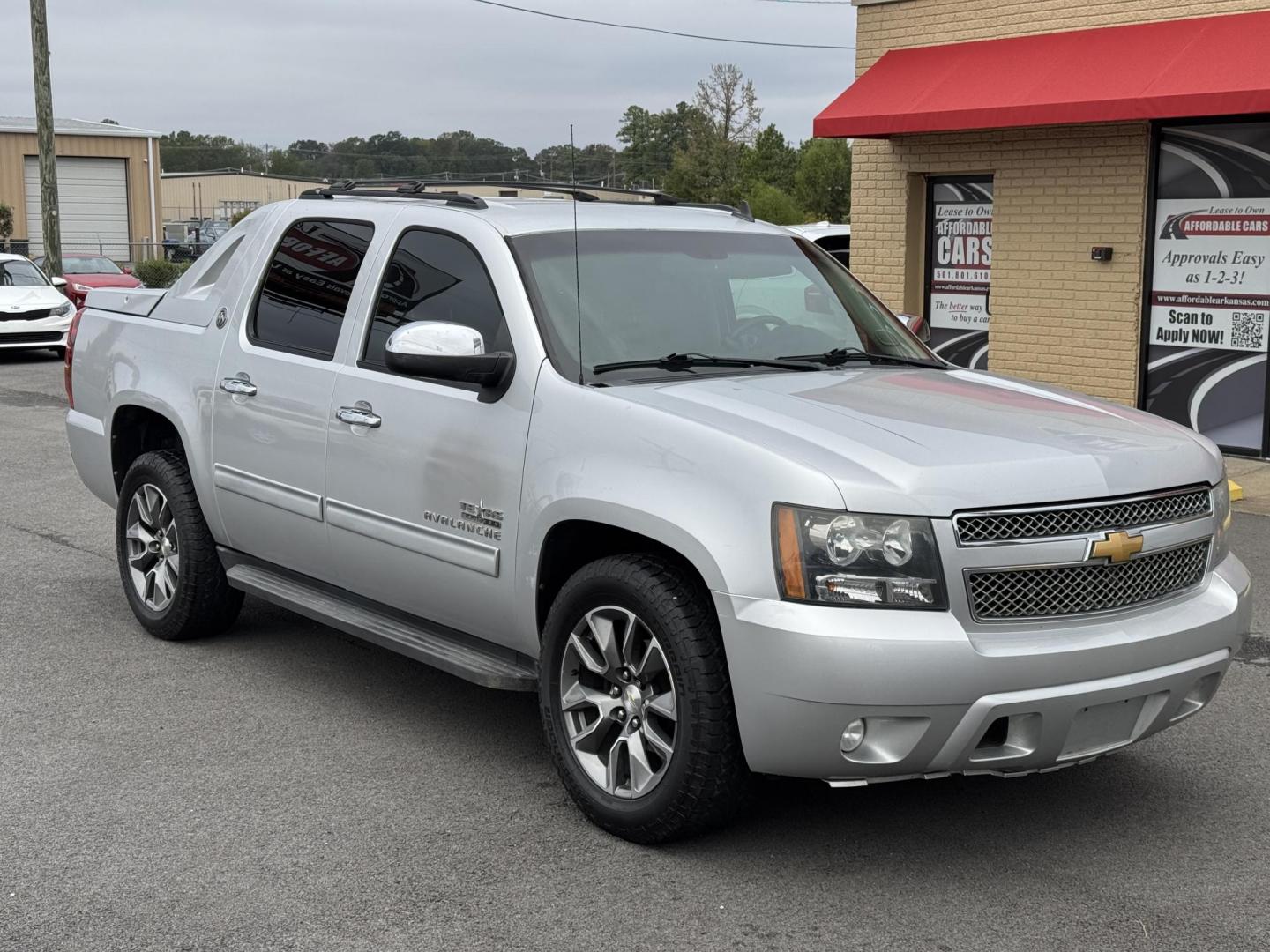 2013 Silver Chevrolet Avalanche (3GNMCEE00DG) with an V8, Flex Fuel, 5.3 Liter engine, Automatic, 6-Spd transmission, located at 8008 Warden Rd, Sherwood, AR, 72120, (501) 801-6100, 34.830078, -92.186684 - Photo#1