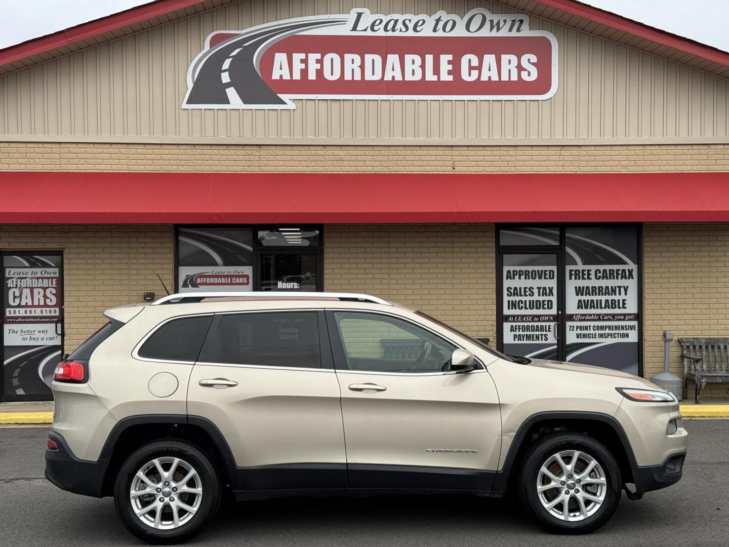 2014 Gold Jeep Cherokee (1C4PJLCB3EW) with an 4-Cyl, 2.4 Liter engine, Automatic, 9-Spd transmission, located at 8008 Warden Rd, Sherwood, AR, 72120, (501) 801-6100, 34.830078, -92.186684 - Photo#0