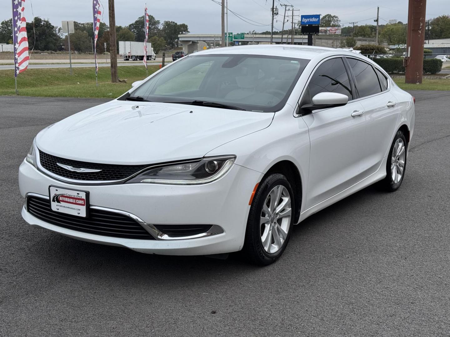 2015 White Chrysler 200 (1C3CCCAB7FN) with an V6, 3.6 Liter engine, Automatic, 9-Spd transmission, located at 8008 Warden Rd, Sherwood, AR, 72120, (501) 801-6100, 34.830078, -92.186684 - Photo#3