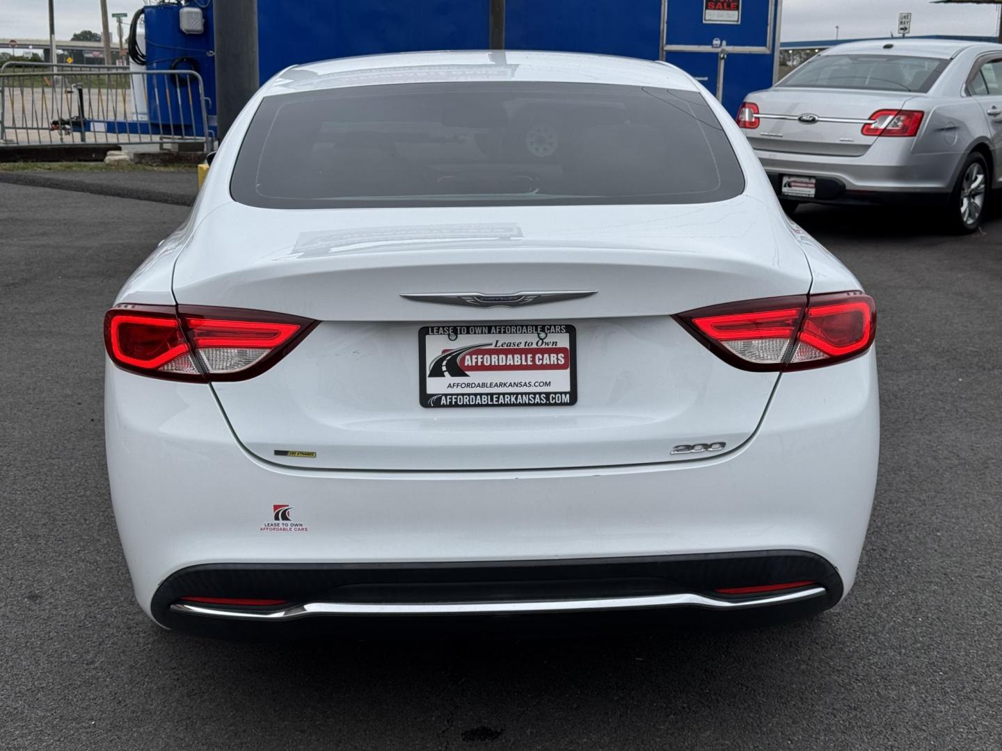 2015 White Chrysler 200 (1C3CCCAB7FN) with an V6, 3.6 Liter engine, Automatic, 9-Spd transmission, located at 8008 Warden Rd, Sherwood, AR, 72120, (501) 801-6100, 34.830078, -92.186684 - Photo#6