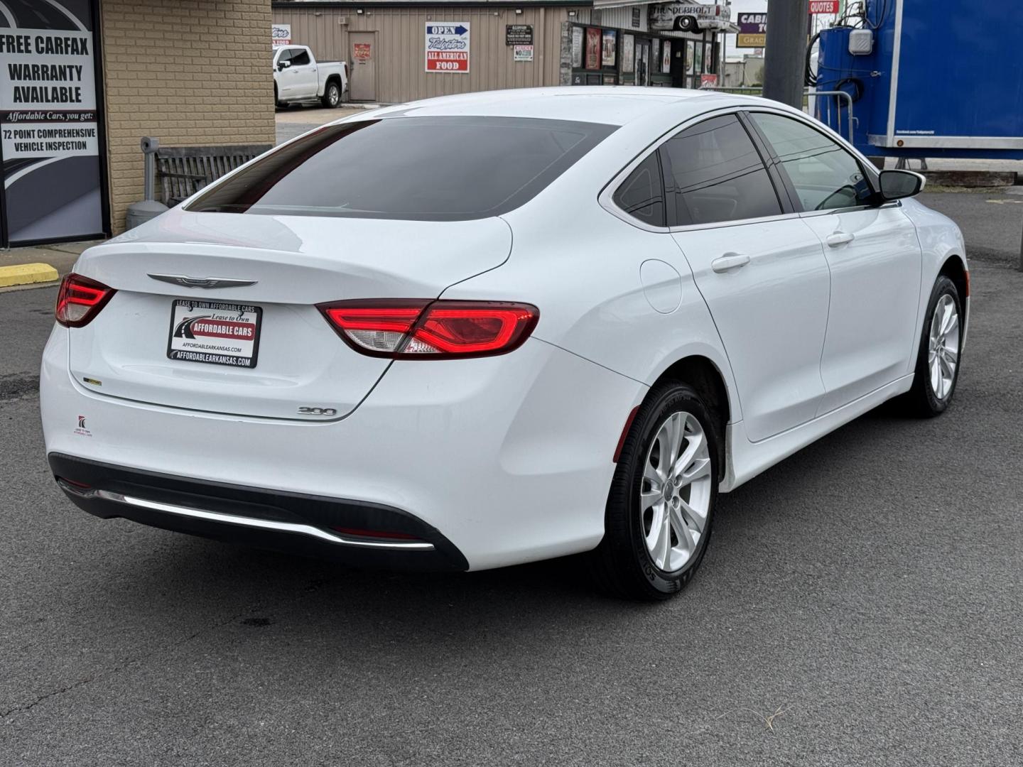 2015 White Chrysler 200 (1C3CCCAB7FN) with an V6, 3.6 Liter engine, Automatic, 9-Spd transmission, located at 8008 Warden Rd, Sherwood, AR, 72120, (501) 801-6100, 34.830078, -92.186684 - Photo#7