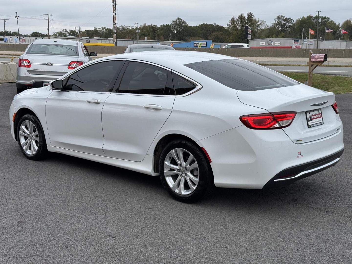 2015 White Chrysler 200 (1C3CCCAB7FN) with an V6, 3.6 Liter engine, Automatic, 9-Spd transmission, located at 8008 Warden Rd, Sherwood, AR, 72120, (501) 801-6100, 34.830078, -92.186684 - Photo#5