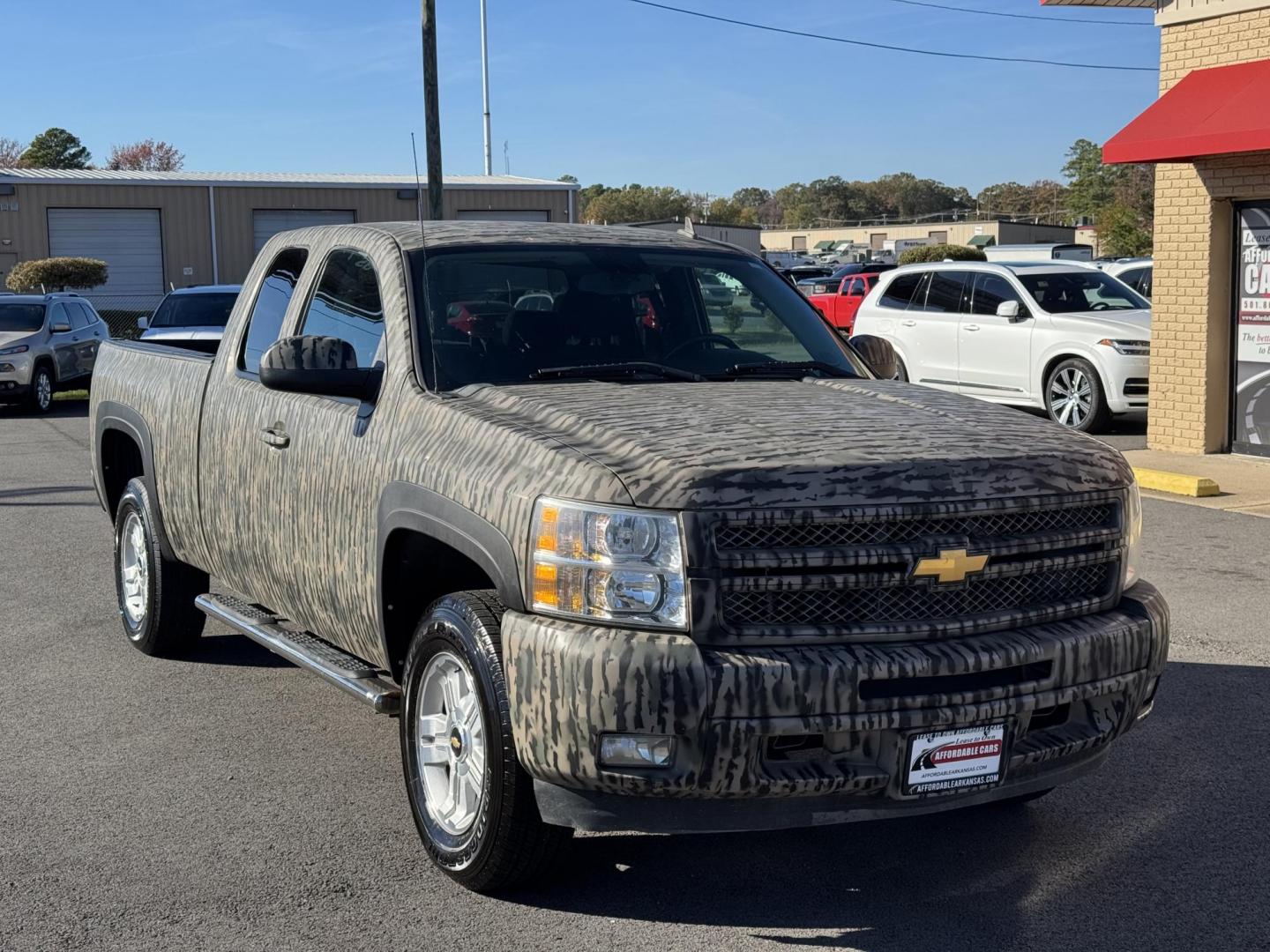 2013 CAMO Chevrolet Silverado 1500 Extended Cab (1GCRKSE75DZ) with an V8, Flex Fuel, 5.3 Liter engine, Automatic, 6-Spd HD w/Overdrive transmission, located at 8008 Warden Rd, Sherwood, AR, 72120, (501) 801-6100, 34.830078, -92.186684 - Photo#1