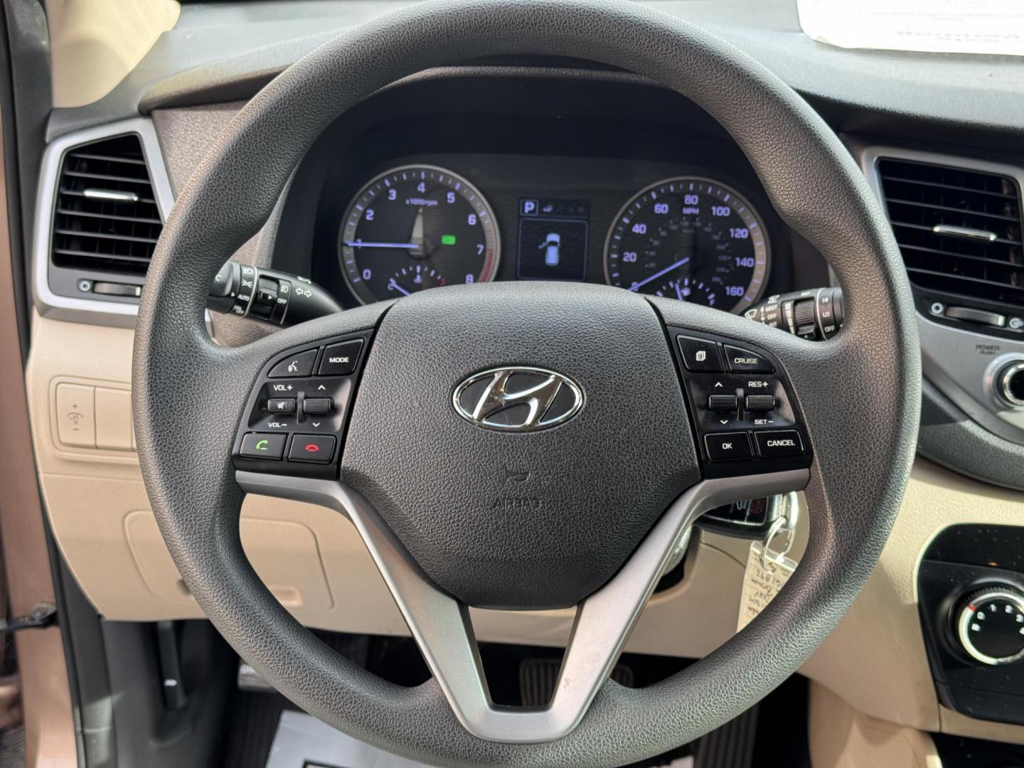 2016 Brown Hyundai Tucson (KM8J33A47GU) with an 4-Cyl, 2.0 Liter engine, Auto, 6-Spd Shiftronic transmission, located at 8008 Warden Rd, Sherwood, AR, 72120, (501) 801-6100, 34.830078, -92.186684 - Photo#14