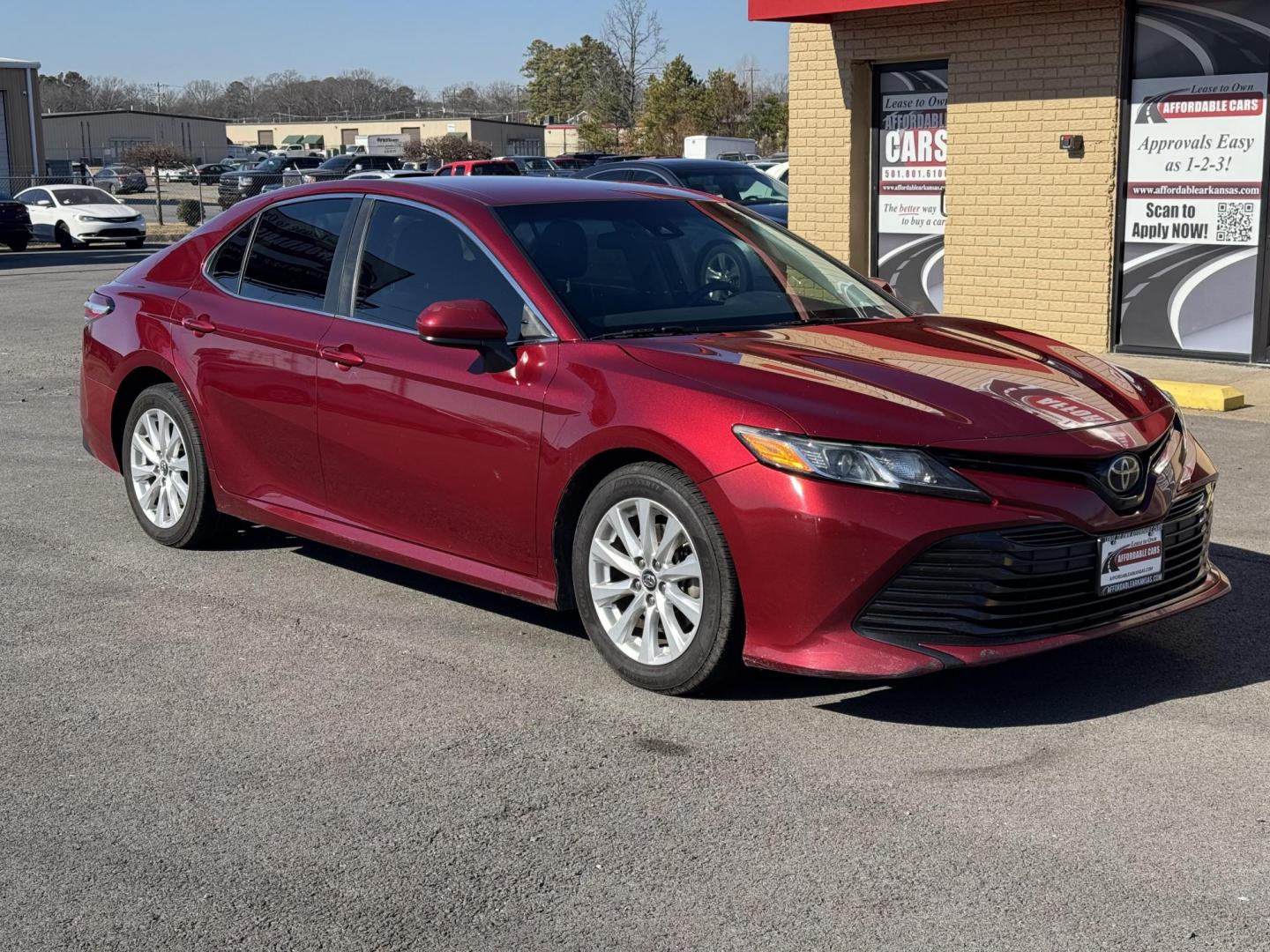 2018 Maroon Toyota Camry (4T1B11HK1JU) with an 4-Cyl, 2.5 Liter engine, Auto, 8-Spd SeqShft transmission, located at 8008 Warden Rd, Sherwood, AR, 72120, (501) 801-6100, 34.830078, -92.186684 - Photo#2