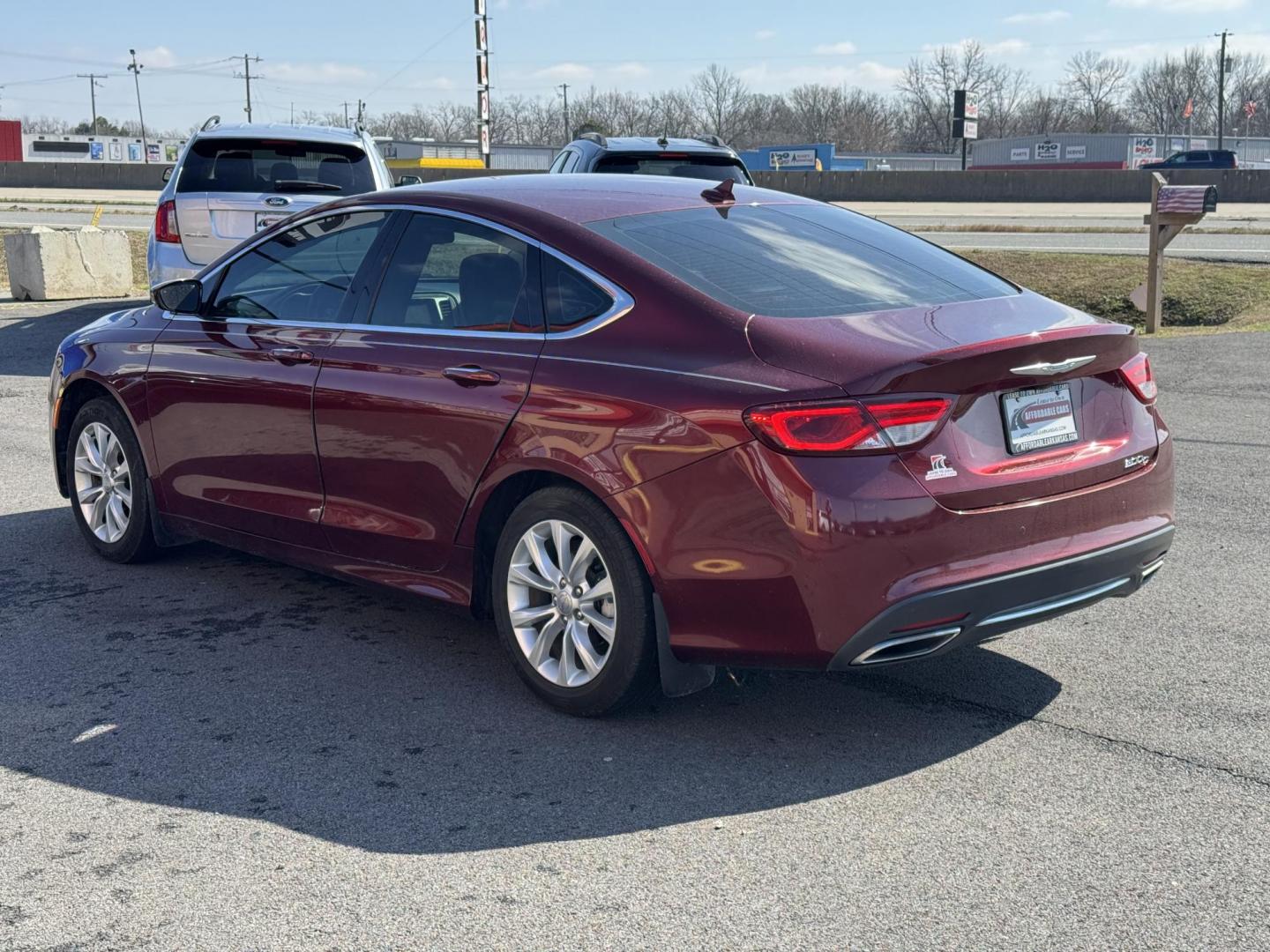 2015 Maroon Chrysler 200 (1C3CCCCG7FN) with an V6, 3.6 Liter engine, Automatic, 9-Spd transmission, located at 8008 Warden Rd, Sherwood, AR, 72120, (501) 801-6100, 34.830078, -92.186684 - Photo#5