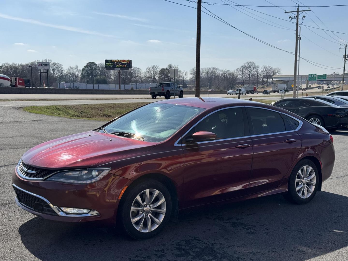 2015 Maroon Chrysler 200 (1C3CCCCG7FN) with an V6, 3.6 Liter engine, Automatic, 9-Spd transmission, located at 8008 Warden Rd, Sherwood, AR, 72120, (501) 801-6100, 34.830078, -92.186684 - Photo#3