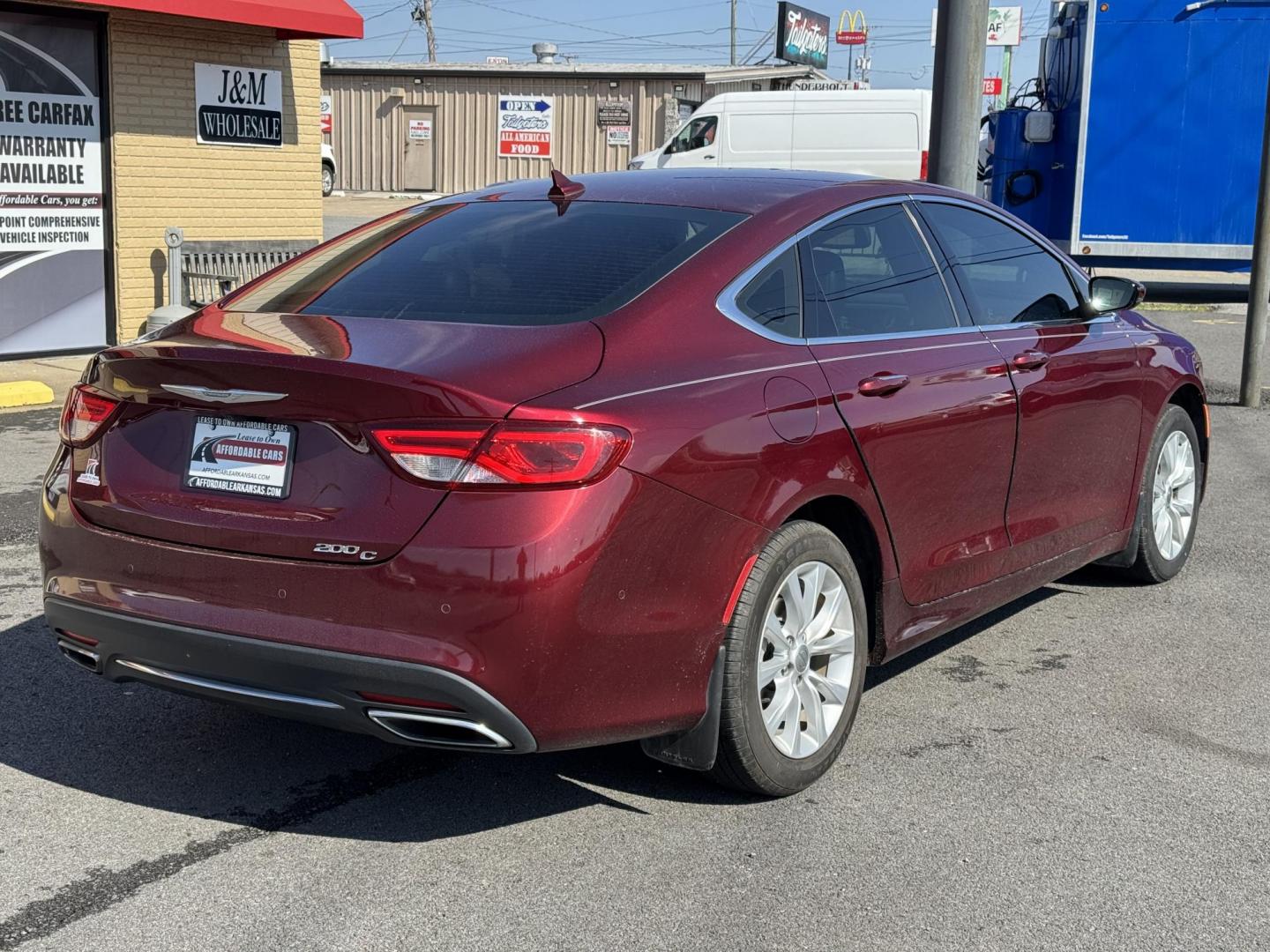 2015 Maroon Chrysler 200 (1C3CCCCG7FN) with an V6, 3.6 Liter engine, Automatic, 9-Spd transmission, located at 8008 Warden Rd, Sherwood, AR, 72120, (501) 801-6100, 34.830078, -92.186684 - Photo#7